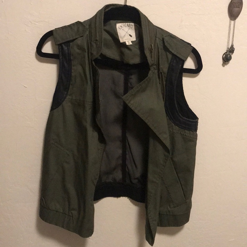 Green and black vest